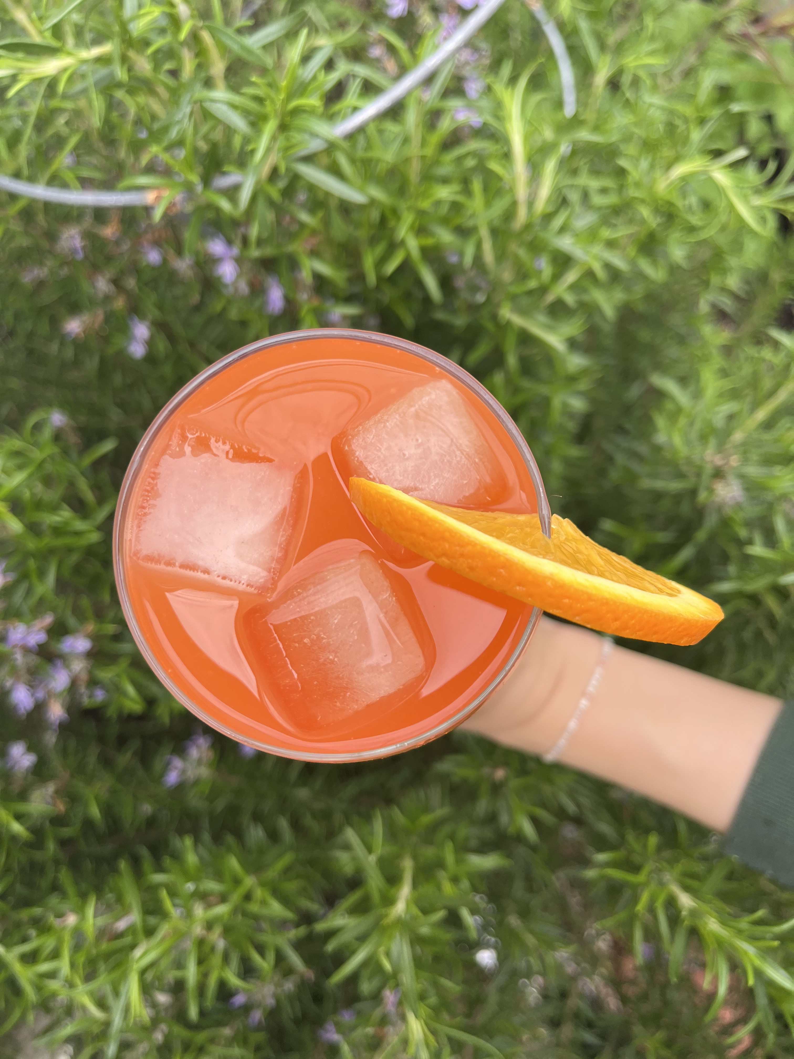 Wineglass with Aperol Spritz inside from the top.
